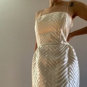 Early 90’s cream dress with fascinator.